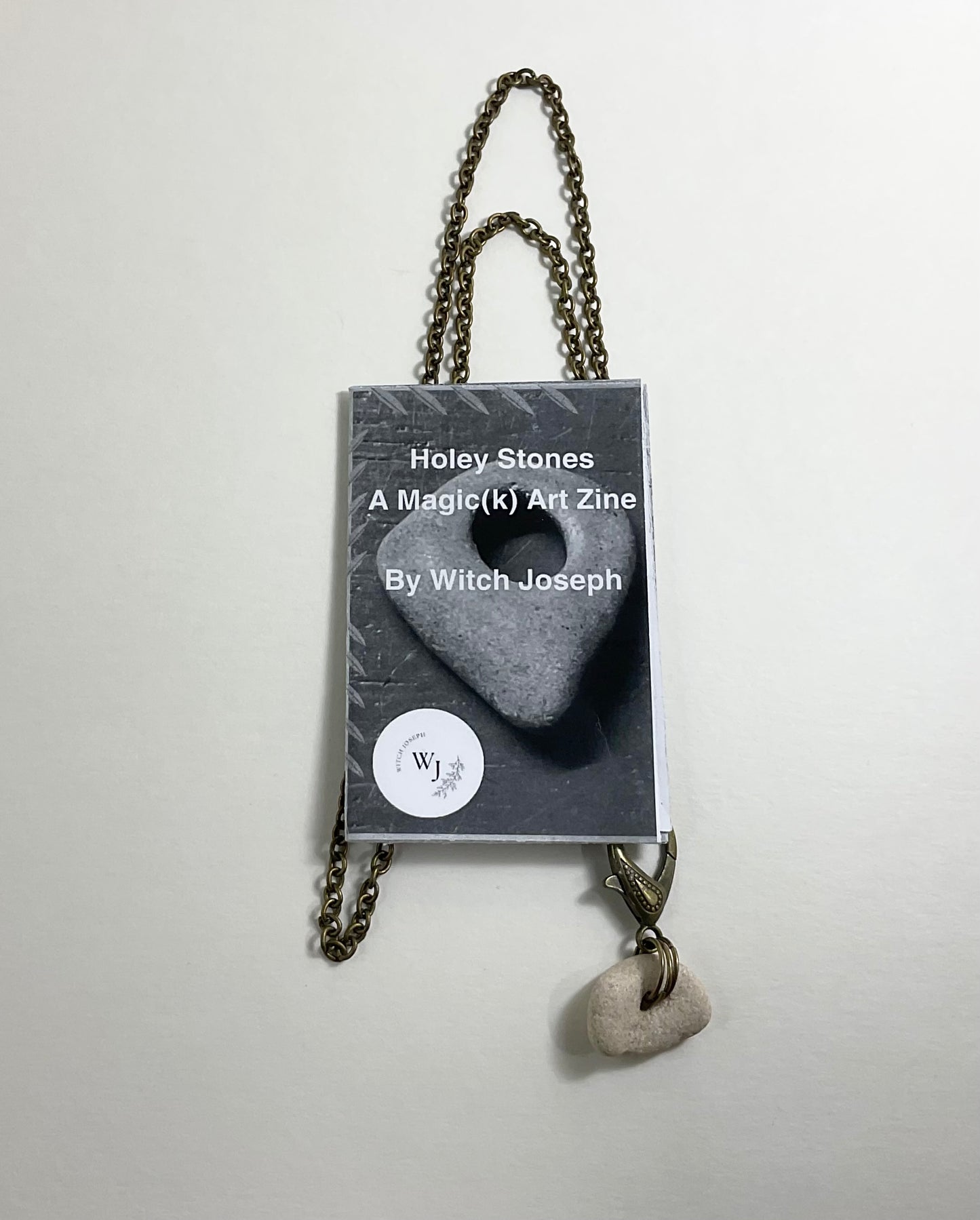 Holey Stone Necklace on bronze tone chain