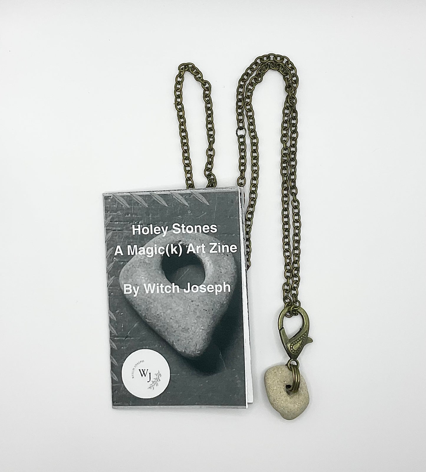 Holey Stone Necklace on bronze tone chain