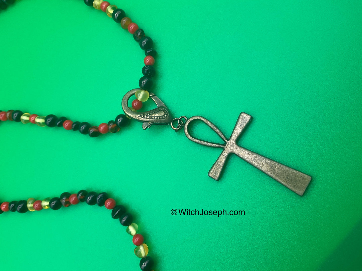 Amber and Jet Ankh Talisman with Red Coral Accents