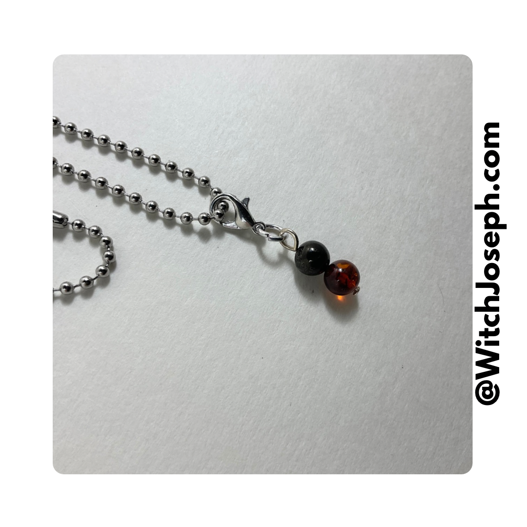 Amber and Jet Charm Necklace small
