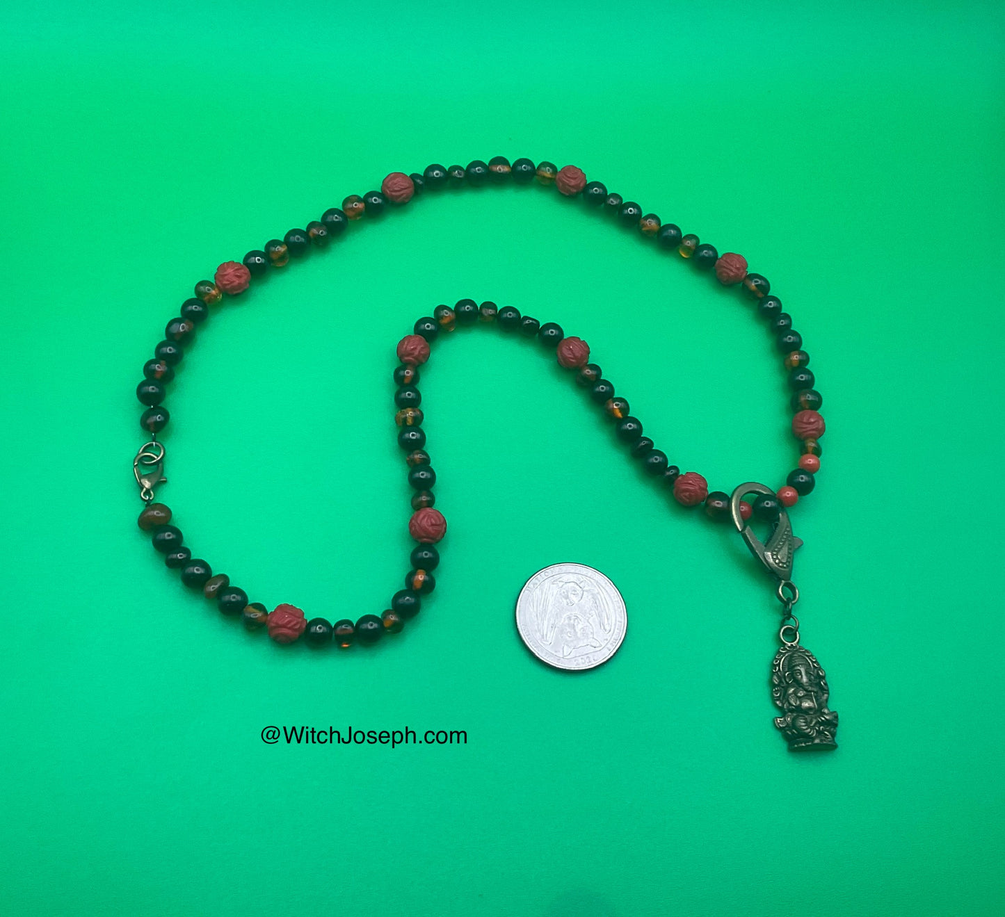 Ganesha Talisman with Amber and Jet and Red Coral Rose accents