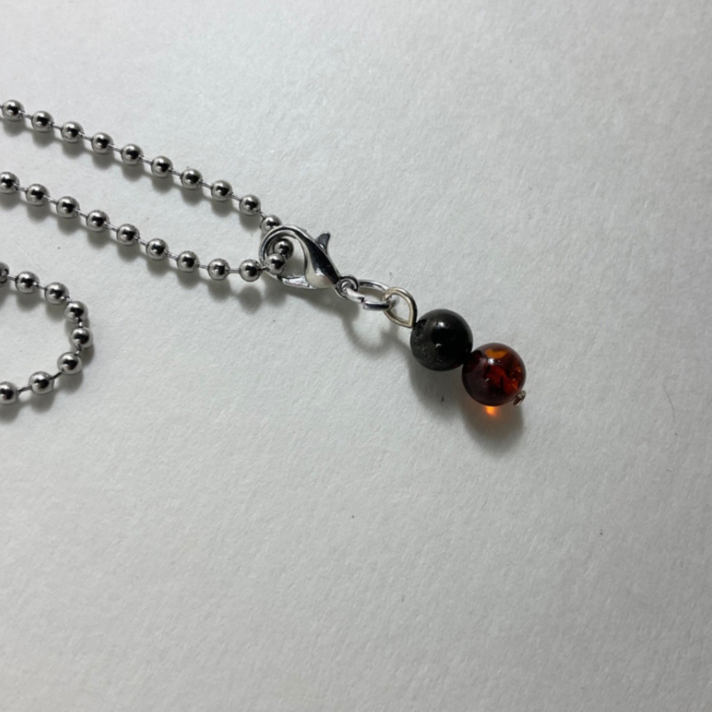 Amber and Jet Charm Necklace
