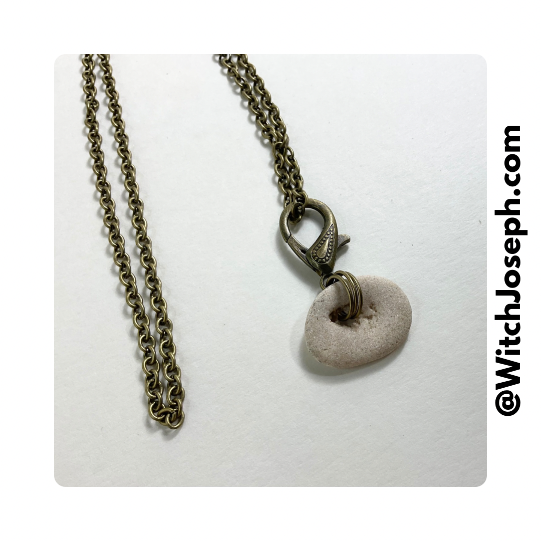 Holey Stone Necklace on bronze tone chain