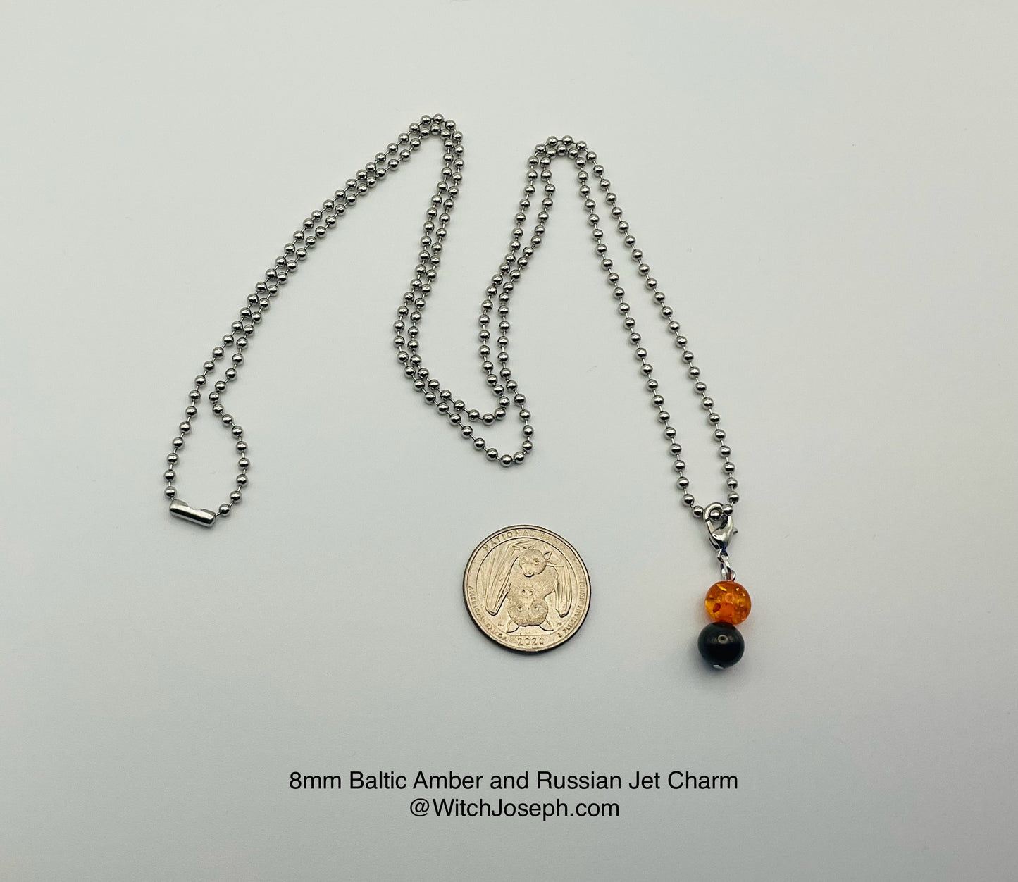 Amber and Jet Charm Necklace large