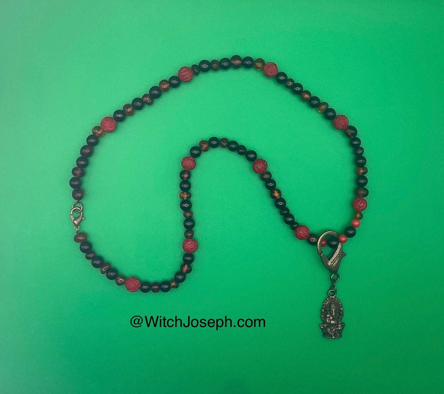 Ganesha Talisman with Amber and Jet and Red Coral Rose accents