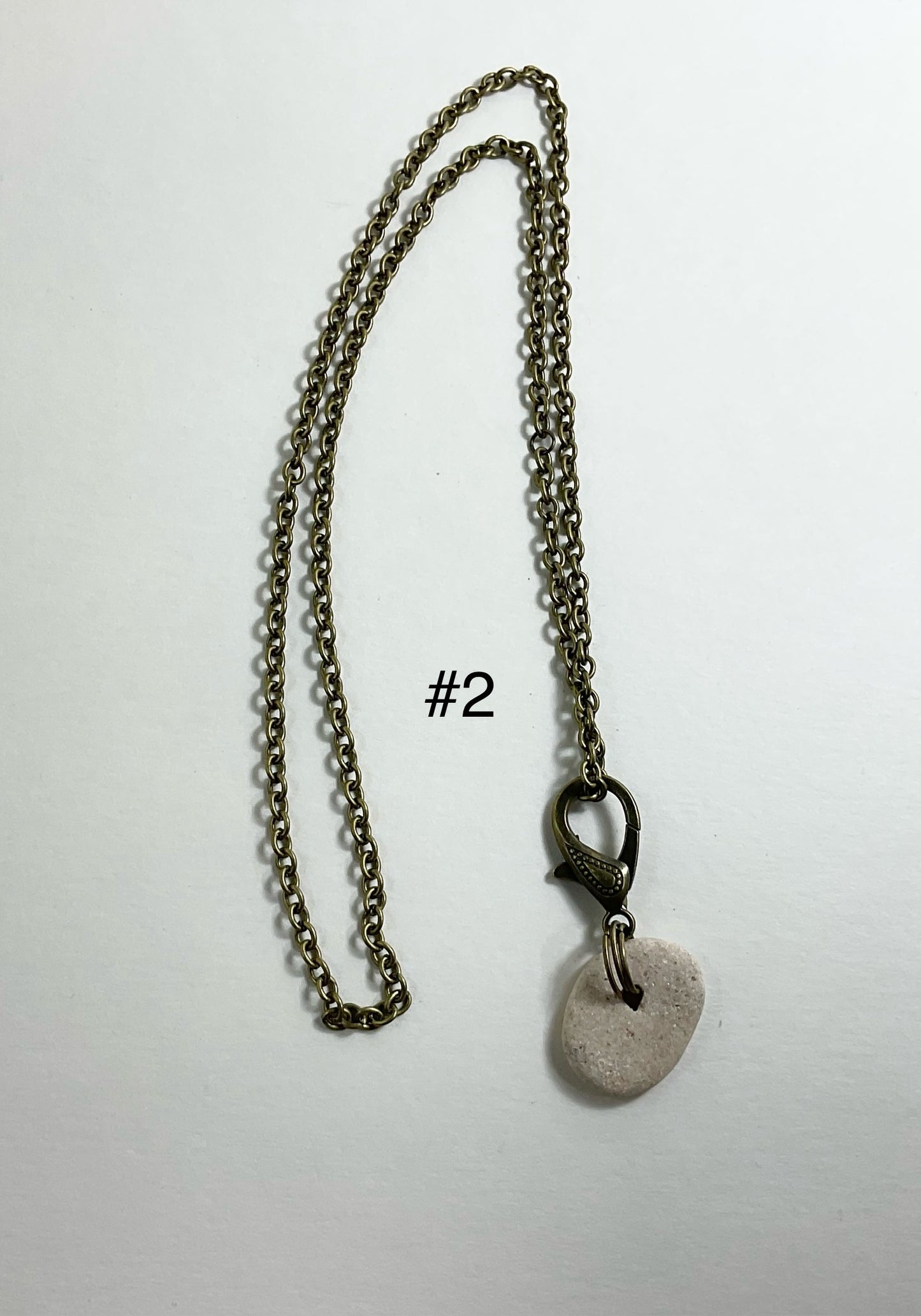Holey Stone Necklace on bronze tone chain