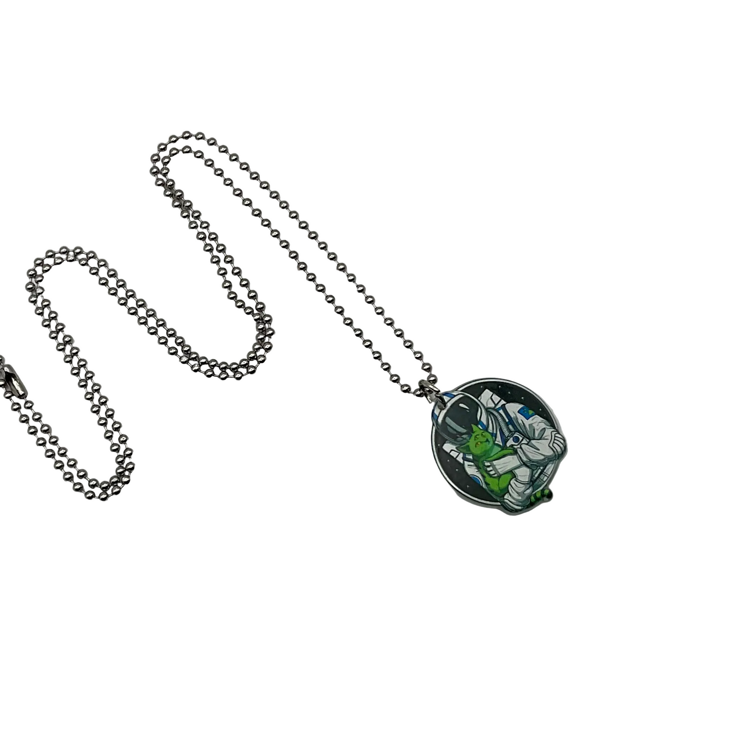 Necklace with a pendant featuring an astronaut with alien cat character design on a white background