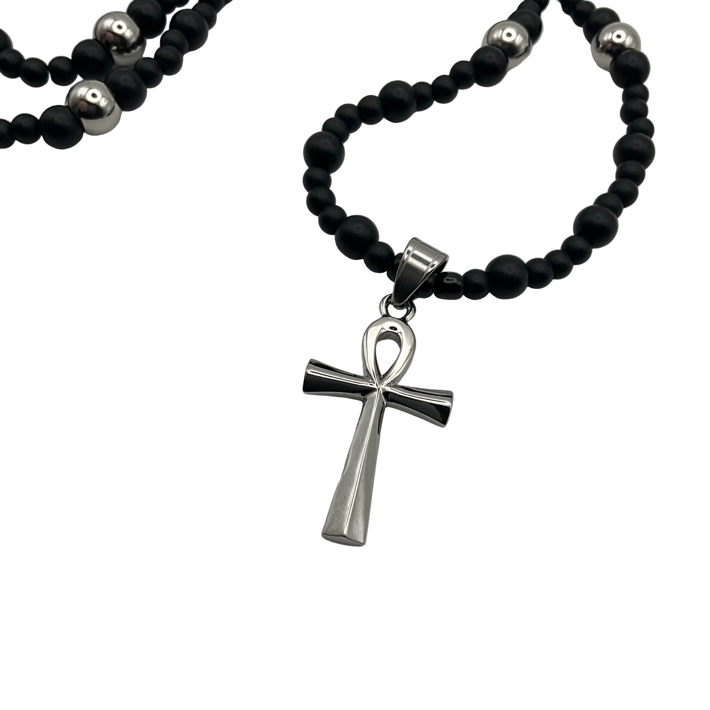Black beaded necklace with a silver ankh cross pendant on a white background
