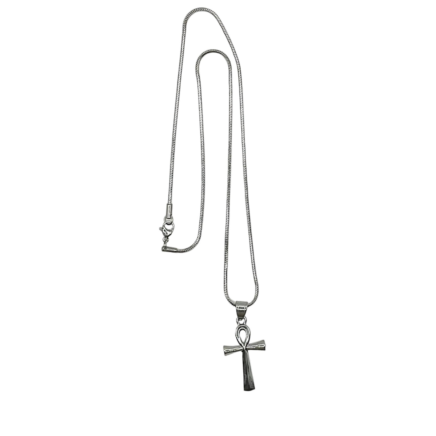Silver tone necklace with an ankh cross pendant on a white background