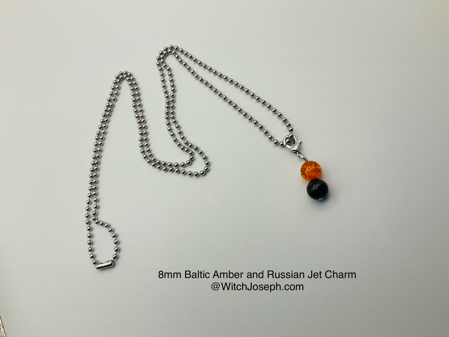 Amber and Jet Charm Necklace large