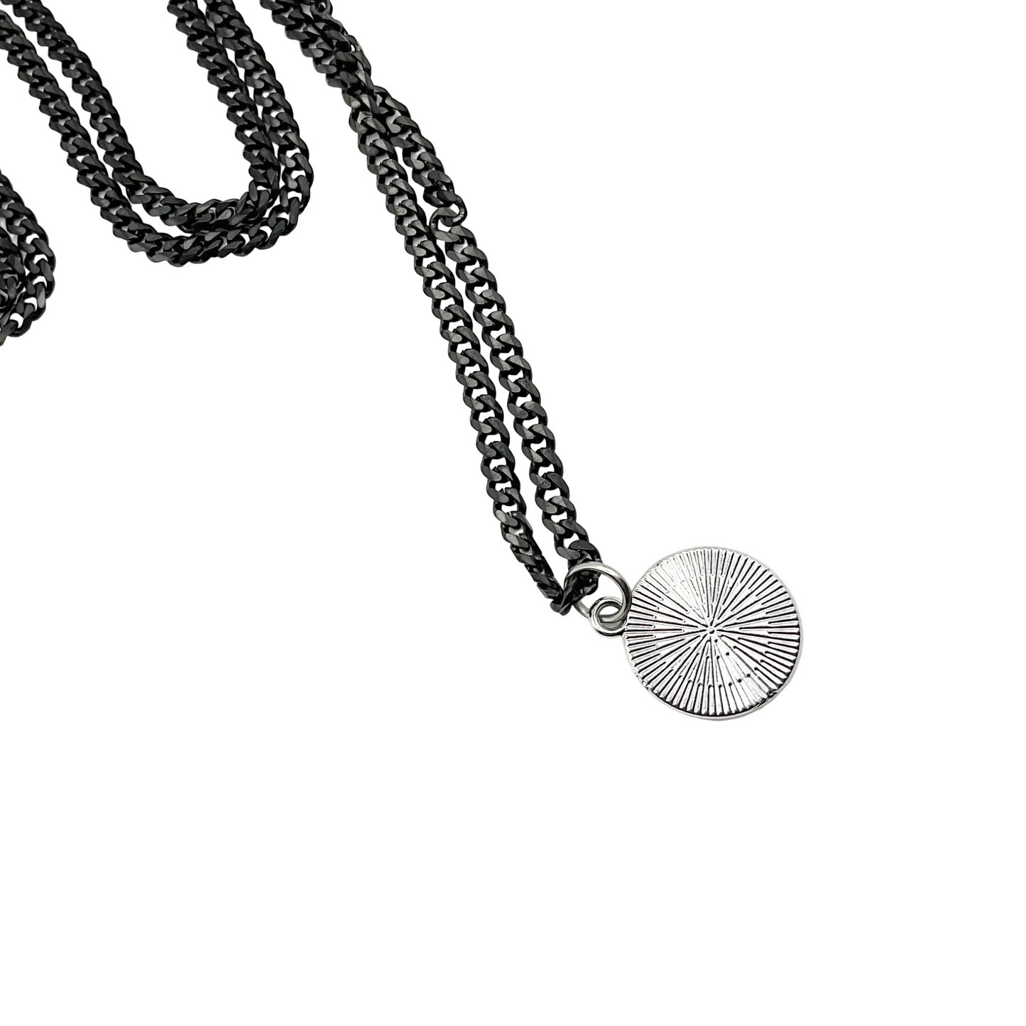 Reverse side of Black Pentacle Necklace on a white background