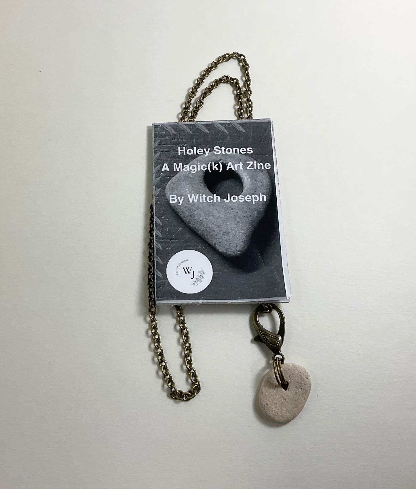 Holey Stone Necklace on bronze tone chain