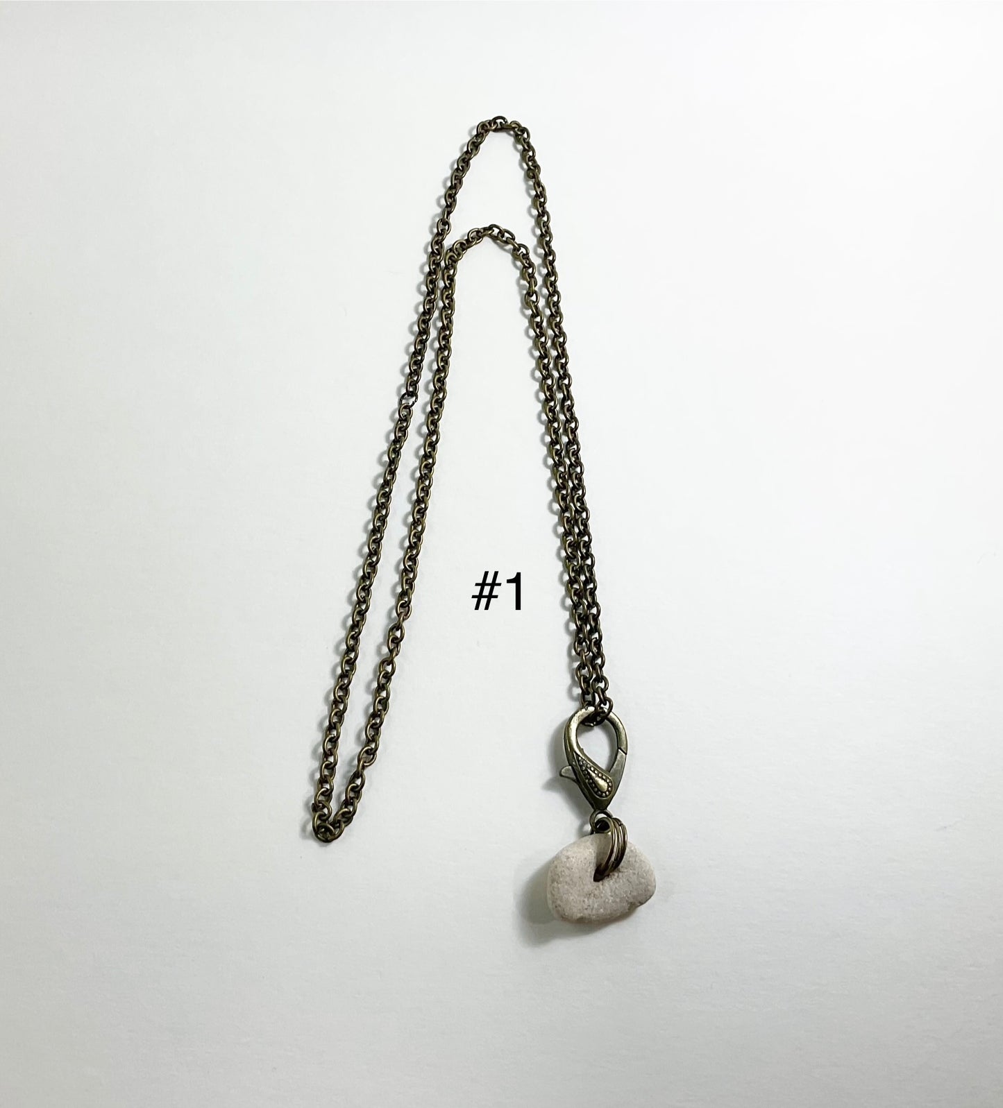 Holey Stone Necklace on bronze tone chain