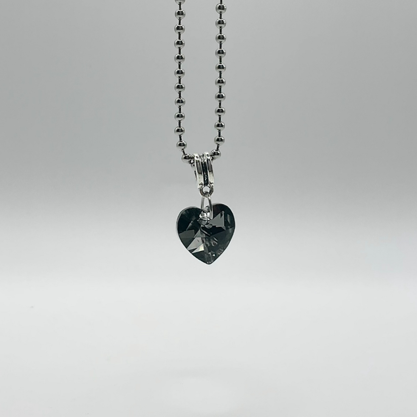 Gray Flash Crystal Heart Talisman