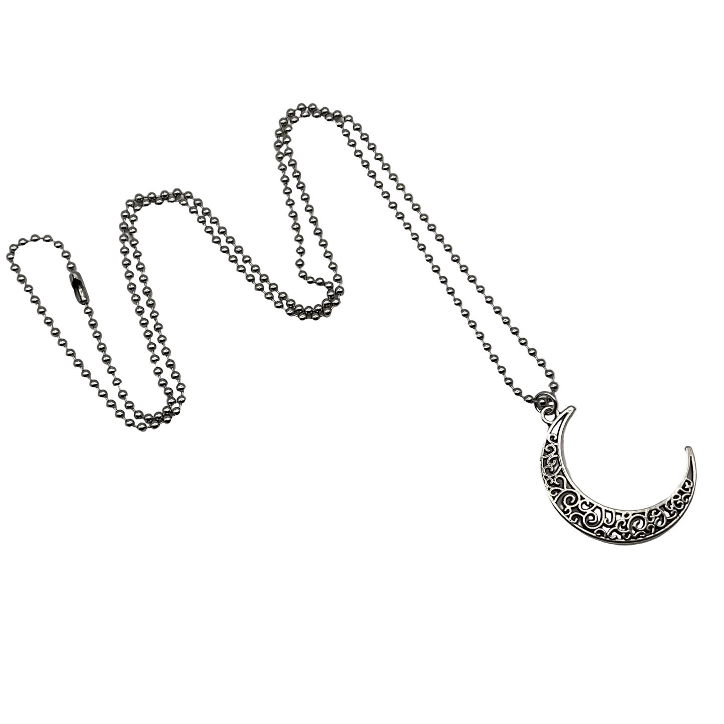 Silver tone ball chain necklace with a silver tone crescent moon pendant with decorative swirls on a light gray background