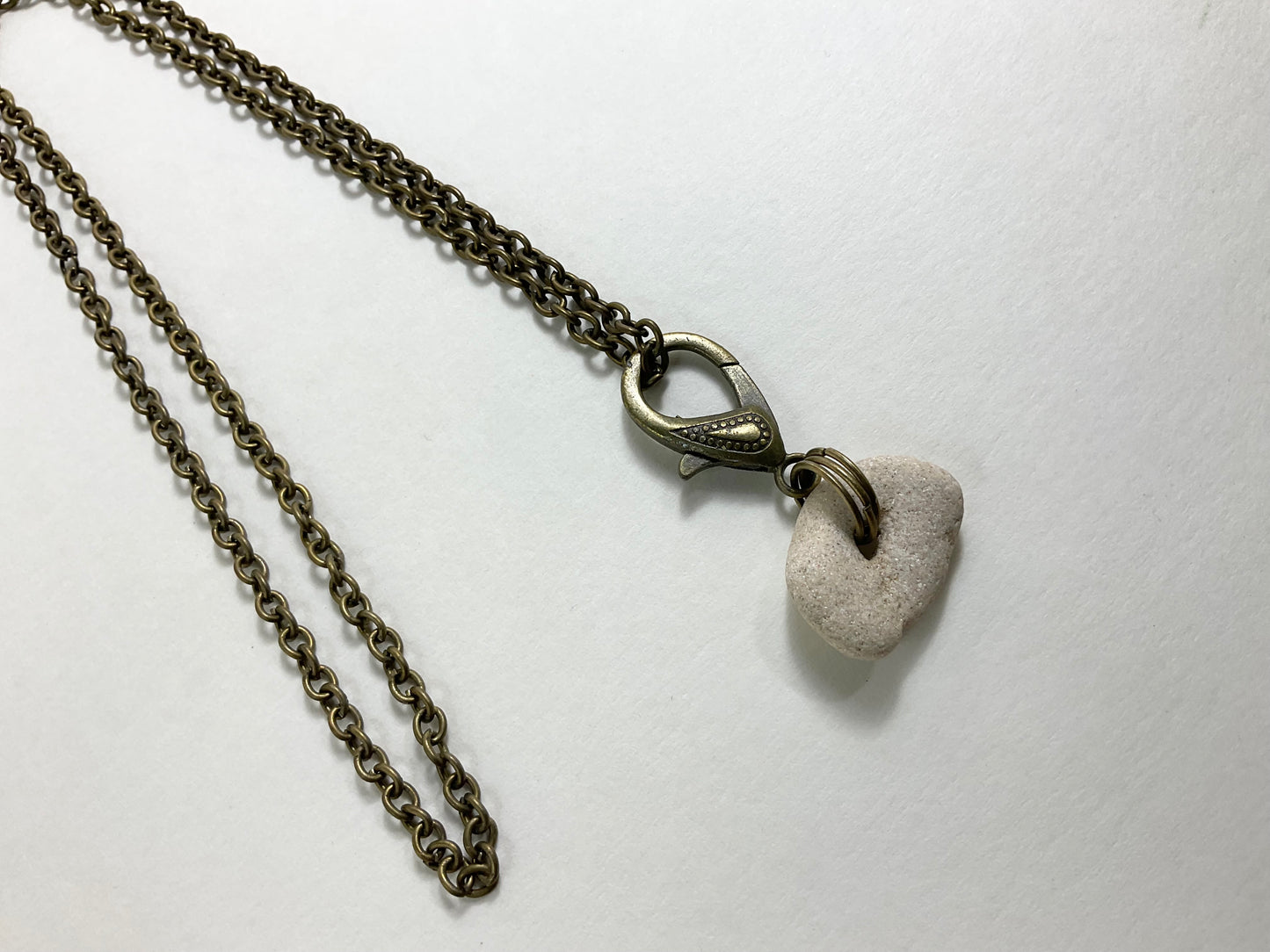 Holey Stone Necklace on bronze tone chain