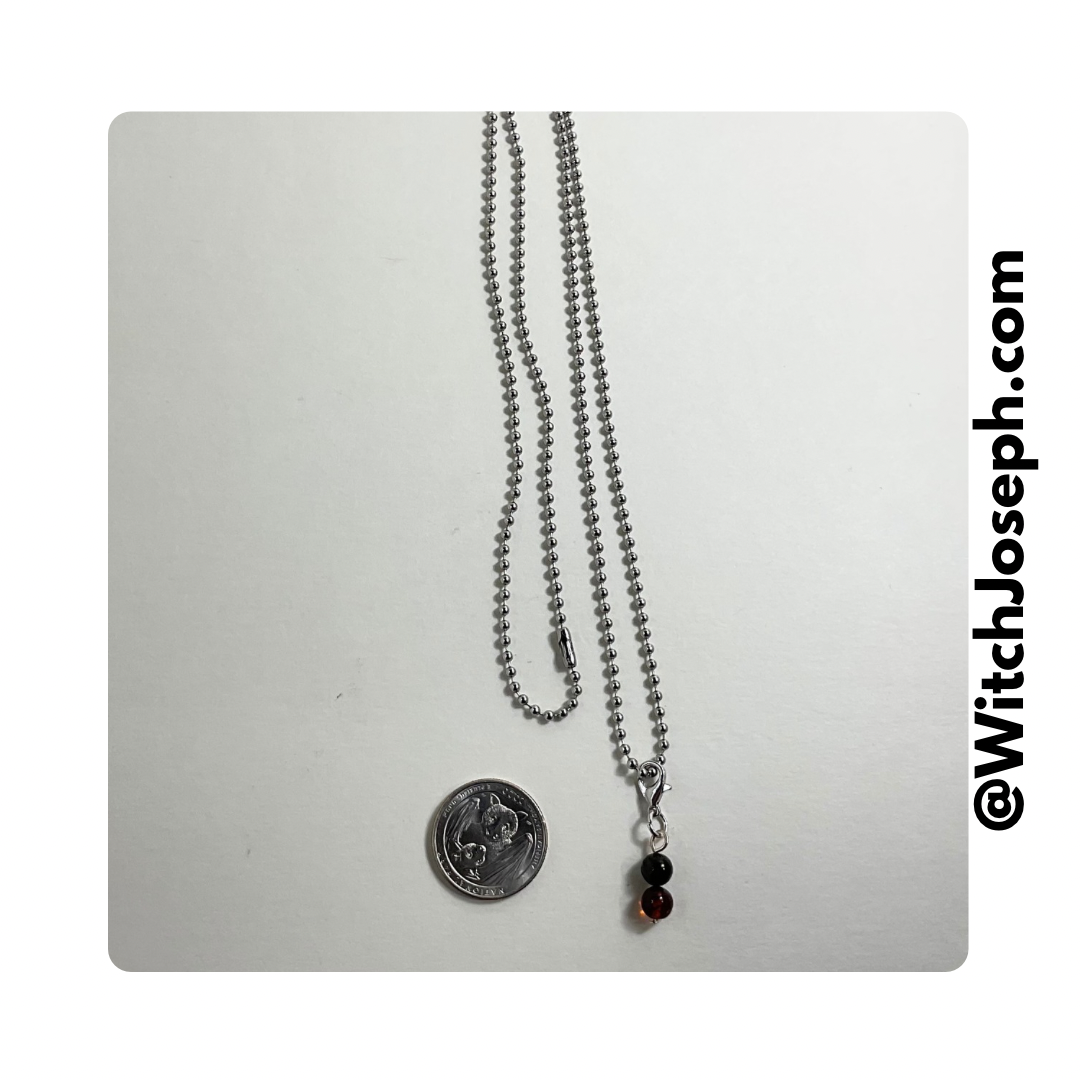 Amber and Jet Charm Necklace small