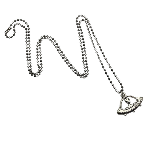 Silver tone flying saucer ball chain necklace with a flying saucer with alien “I want to believe” pendant on a white background