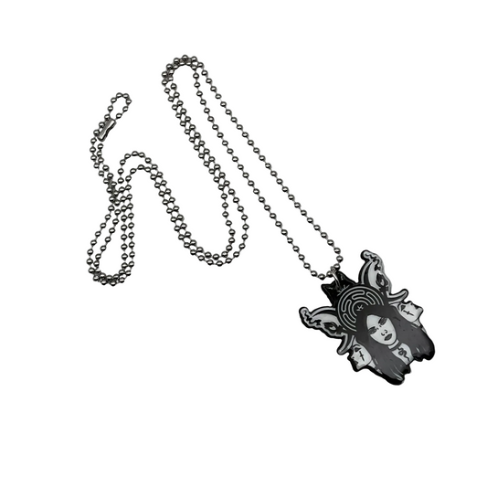 Necklace with a pendant featuring a stylized triple face Hekate design with Straphalos on a white background