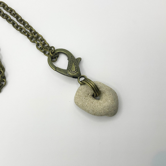 Holey Stone Necklace on bronze tone chain
