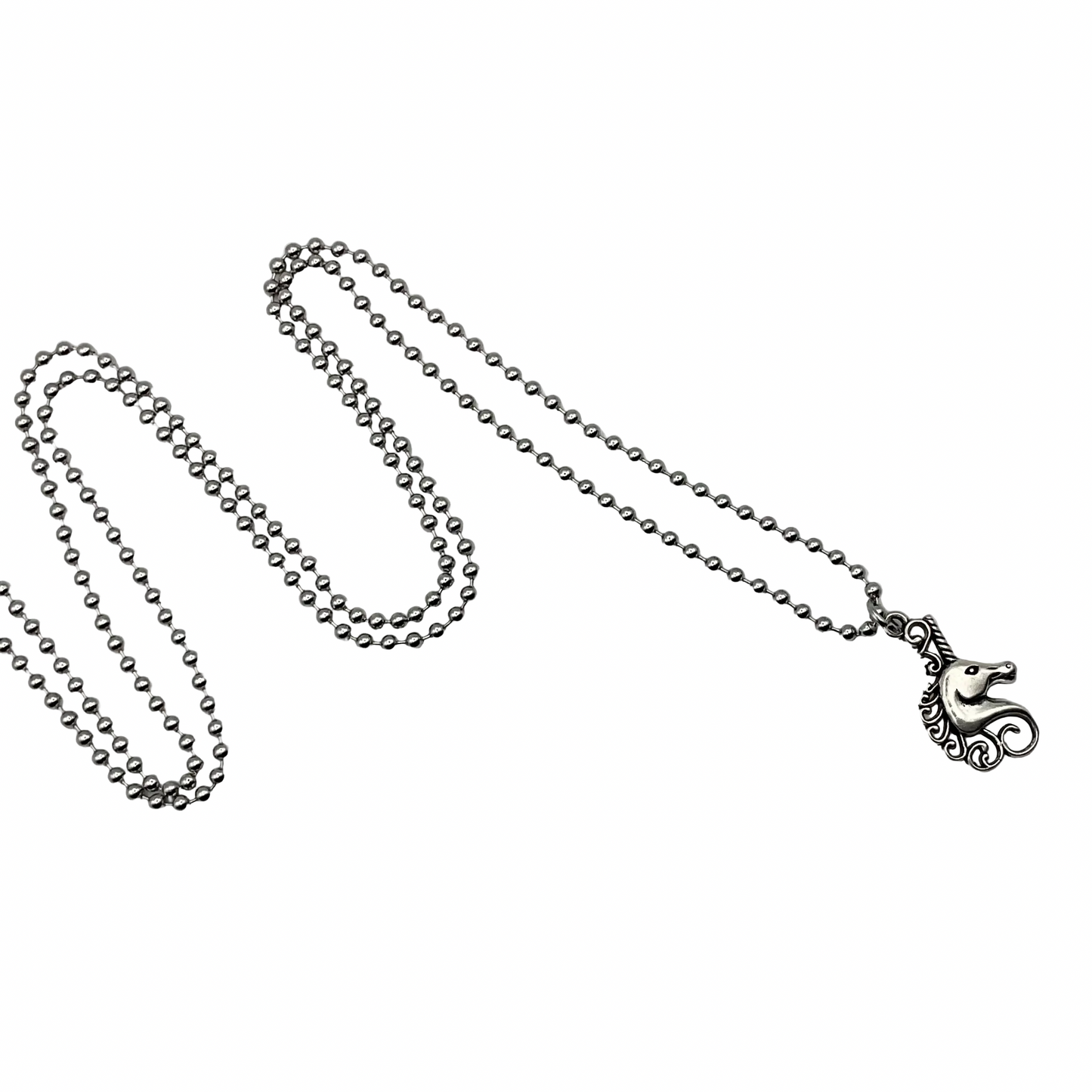 Silver tone ball chain necklace with a small Unicorn bust pendant on a white background