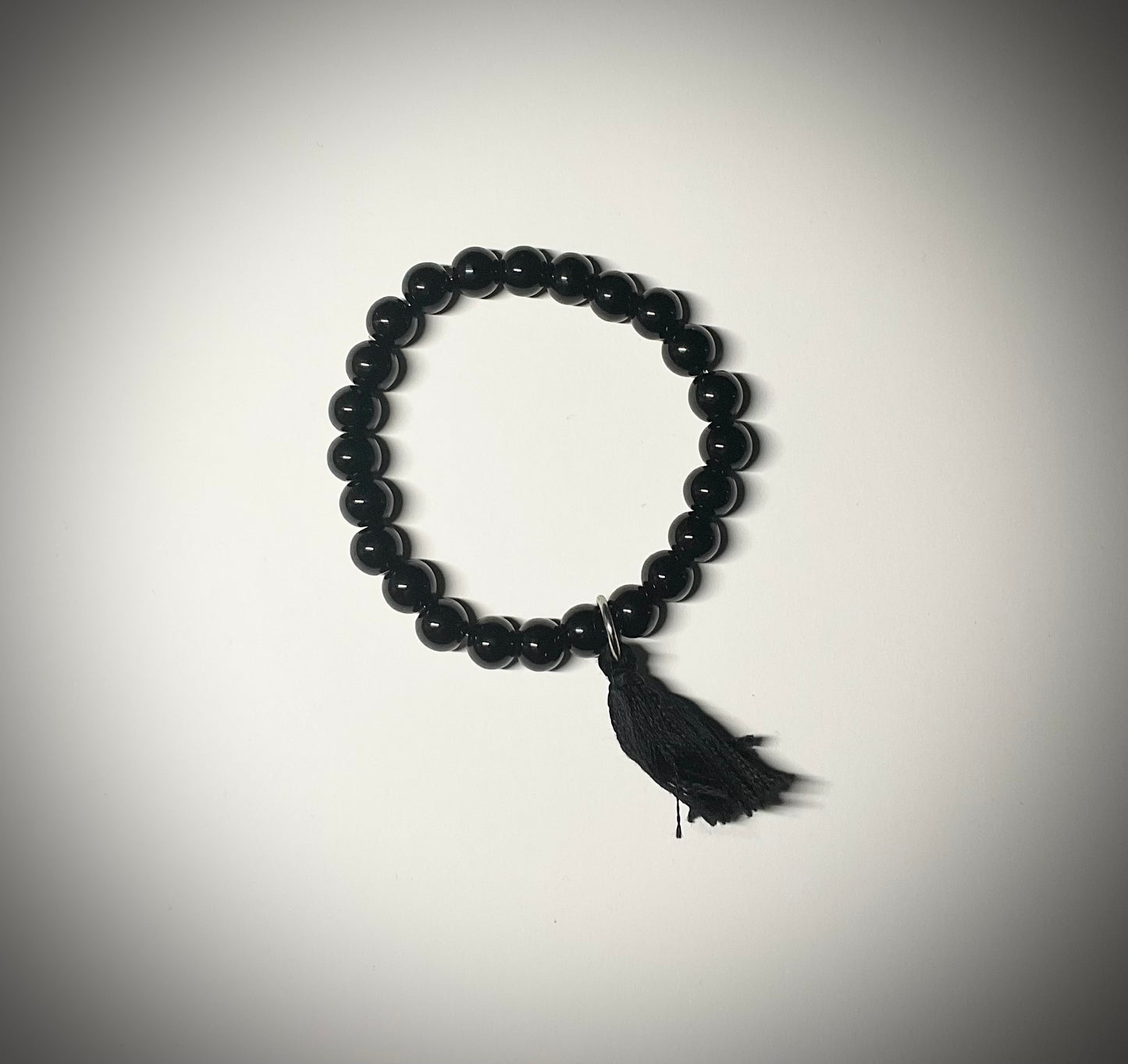 Black Mala Stretch Bracelet with Tassel