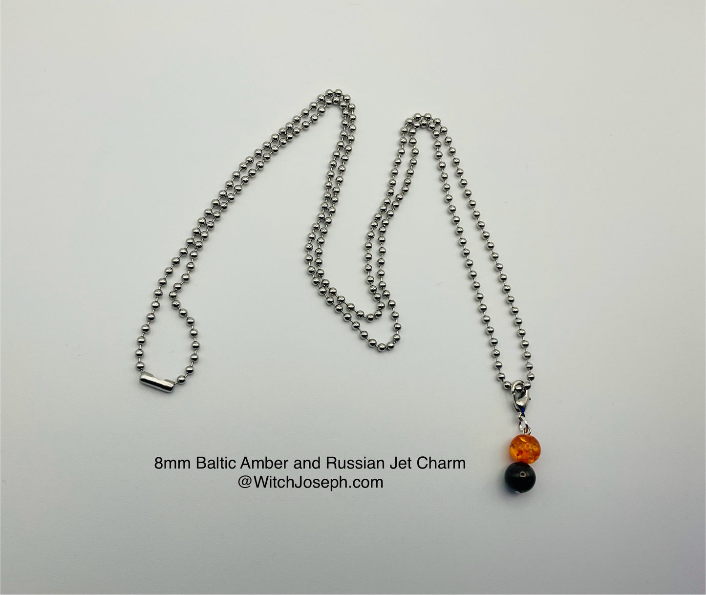 Amber and Jet Charm Necklace large