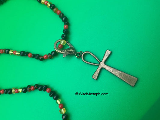 Amber and Jet Ankh Talisman with Red Coral Accents