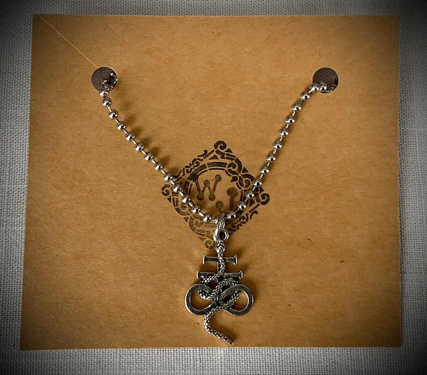 Leviathan Cross with Serpent Charm Necklace