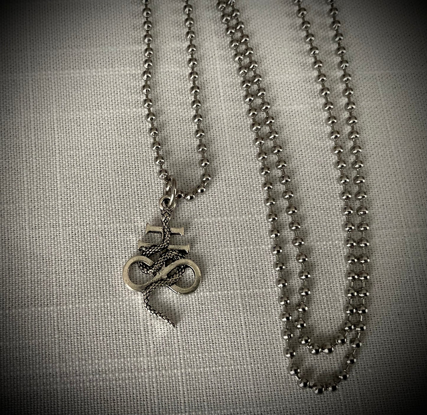 Leviathan Cross with Serpent Charm Necklace