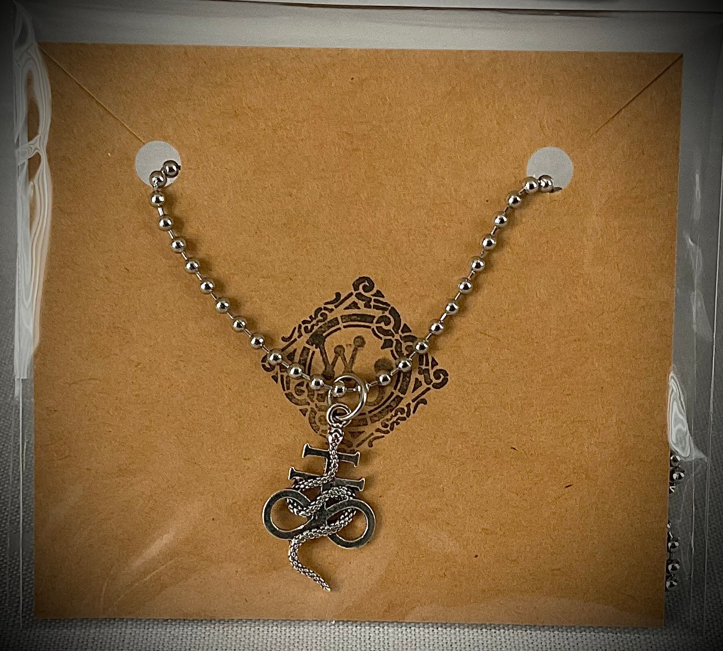 Leviathan Cross with Serpent Charm Necklace