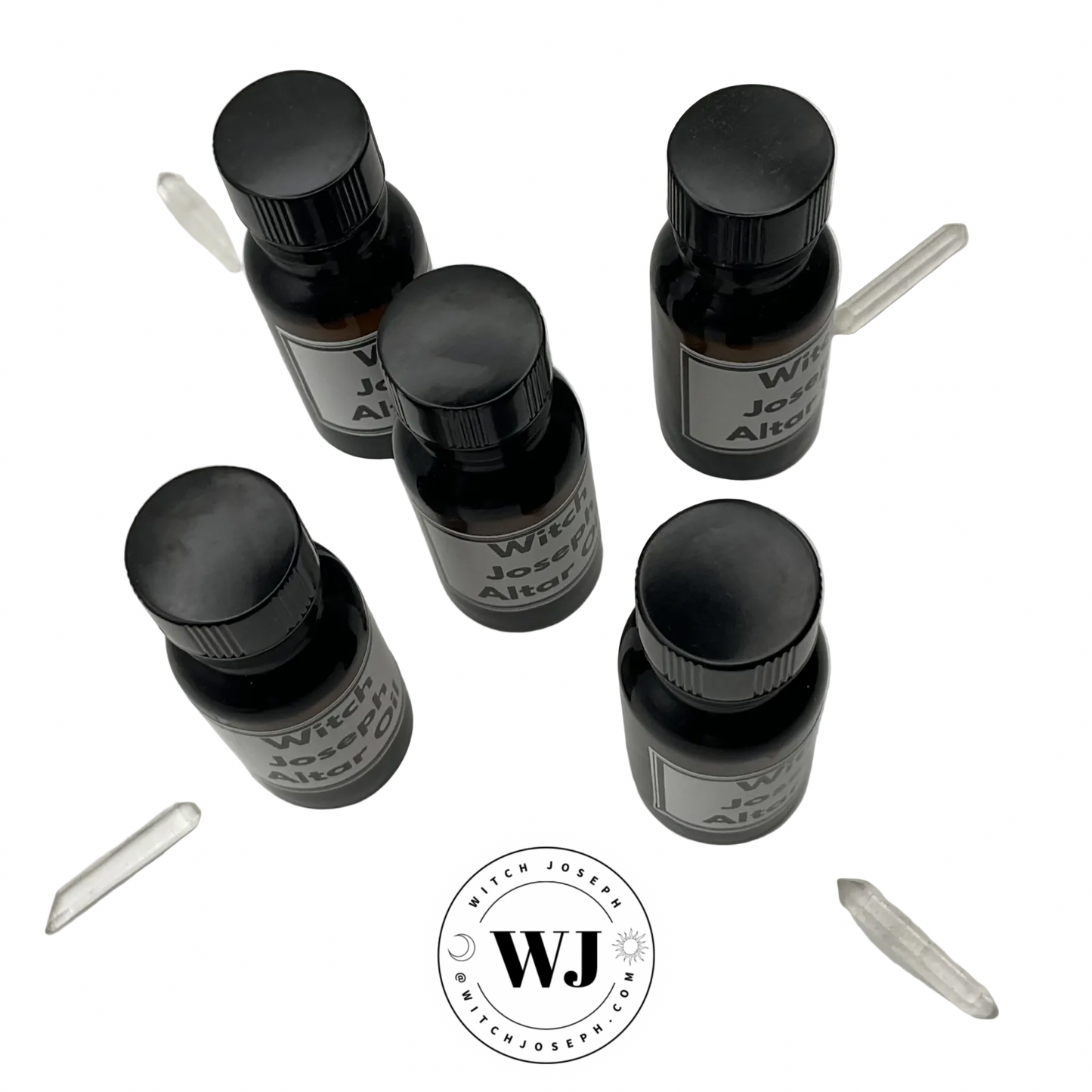 5 amber bottles of Witch Joseph altar oil bottles with labels displayed on a white background