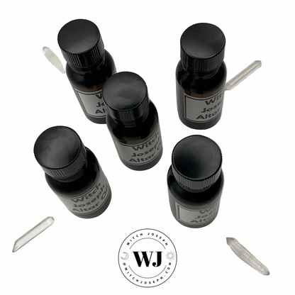 5 amber bottles of Witch Joseph altar oil bottles with labels displayed on a white background