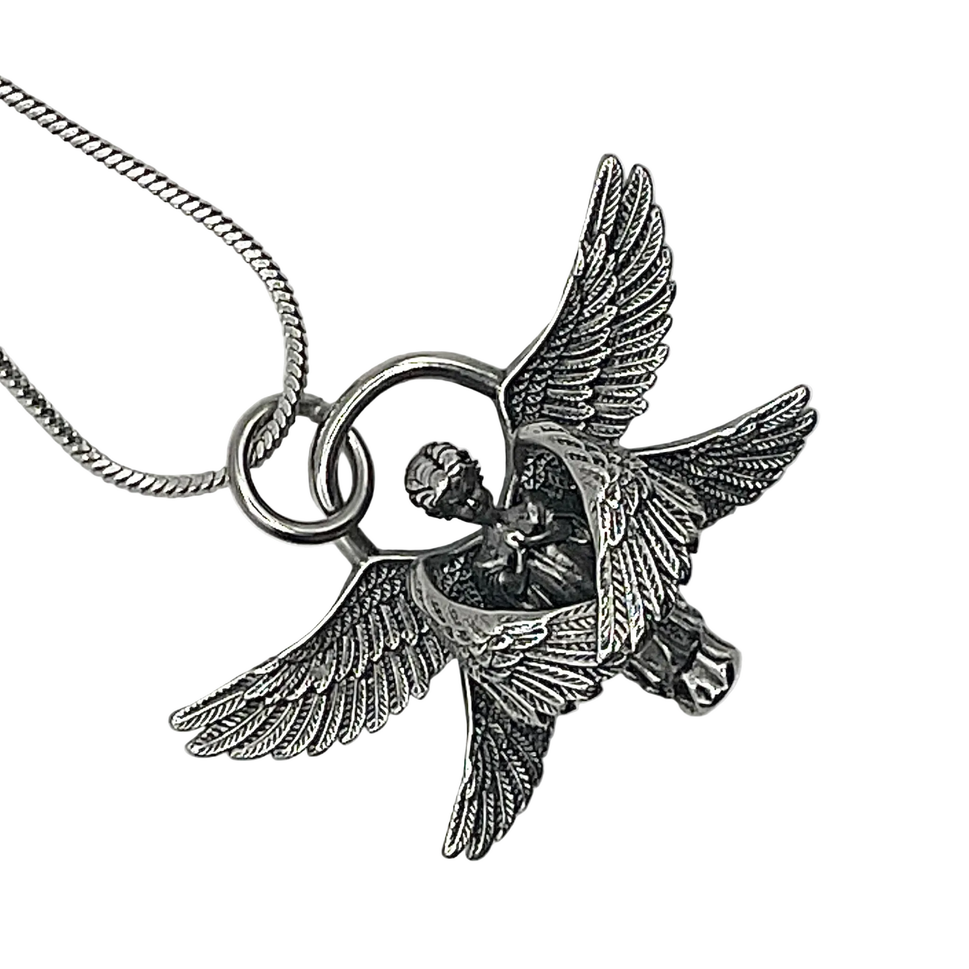 Silver tone angel pendant necklace on a white background