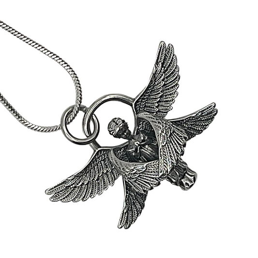 Silver tone angel pendant necklace on a white background