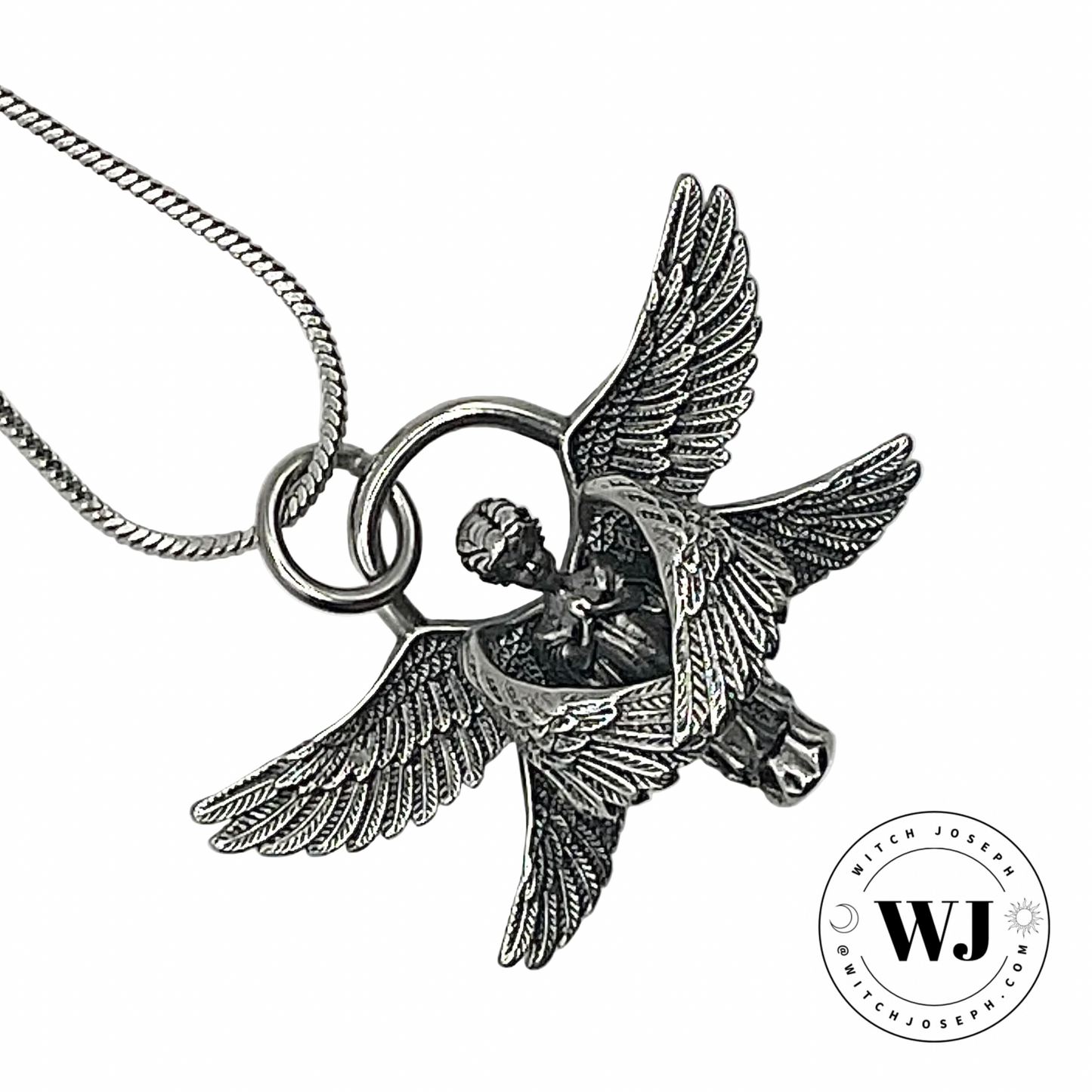 Wings of Light Angelic Talisman in silver tone displayed against a white background with the Witch Joseph Logo