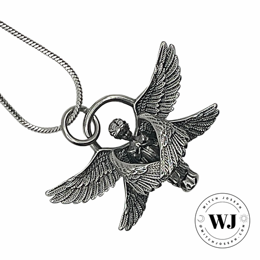 Wings of Light Angelic Talisman in silver tone displayed against a white background with the Witch Joseph Logo