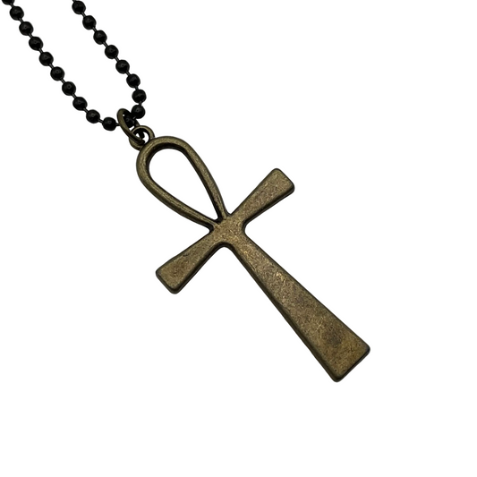 Bronze tone ankh cross necklace on a white background