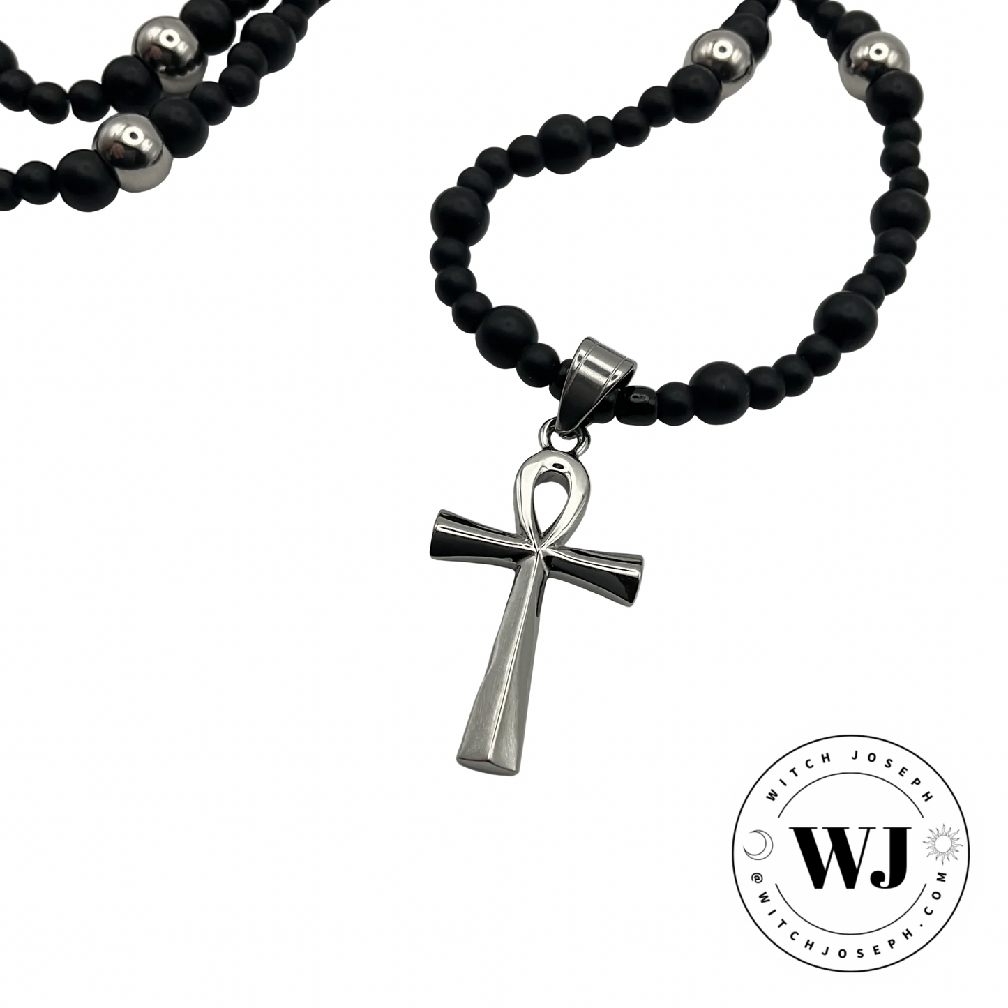 Silver tone Ankh necklace with black and silver tone beads displayed against a white background with the Witch Joseph Logo