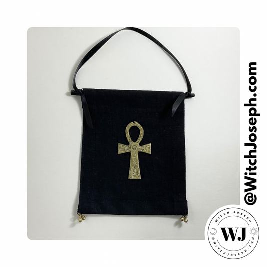 Black cloth with gold ankh symbol for hanging on the wall… displayed on a white background, featuring the brand 'Witch Joseph'.
