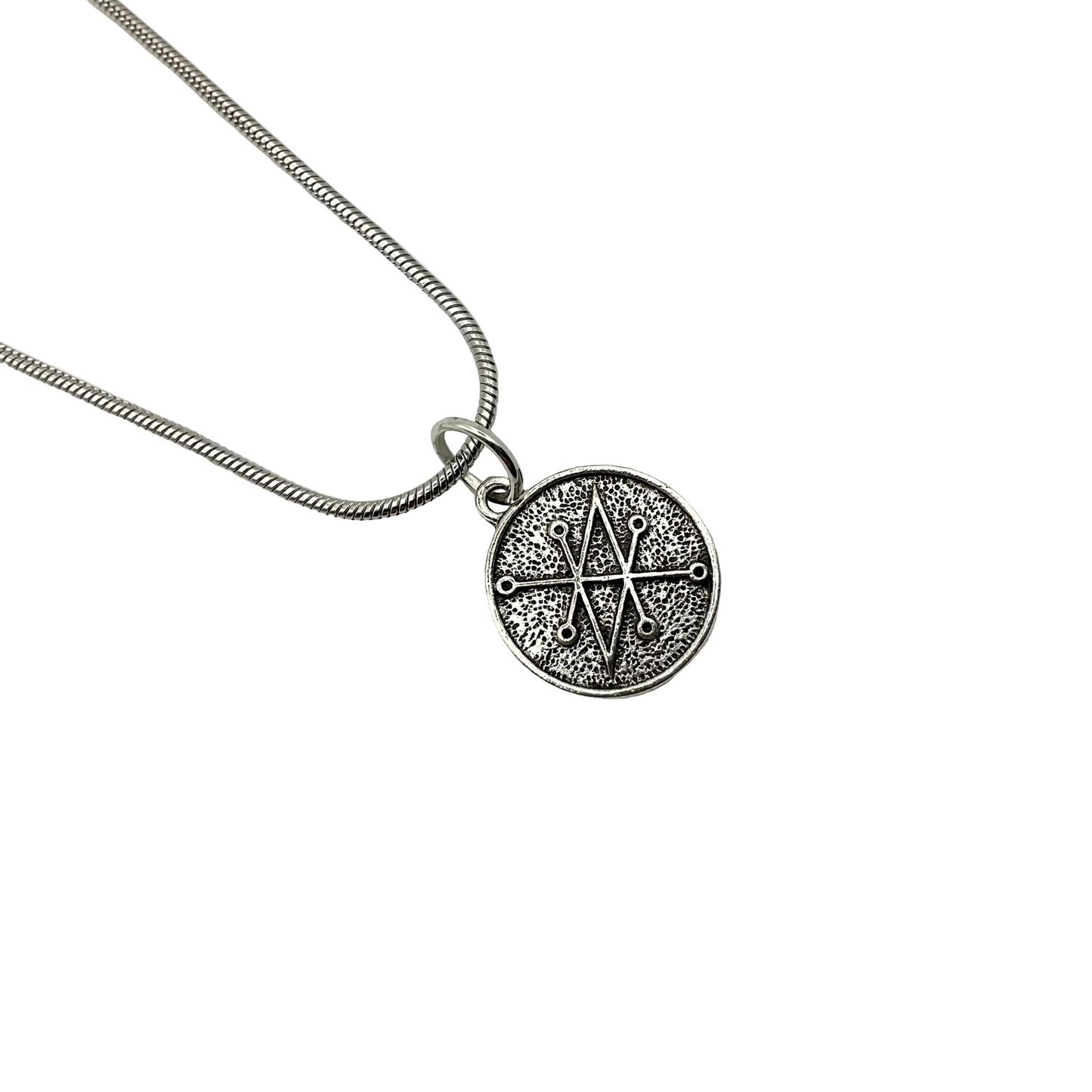 Silver tone necklace with a round Azazel Seal pendant on a white background.