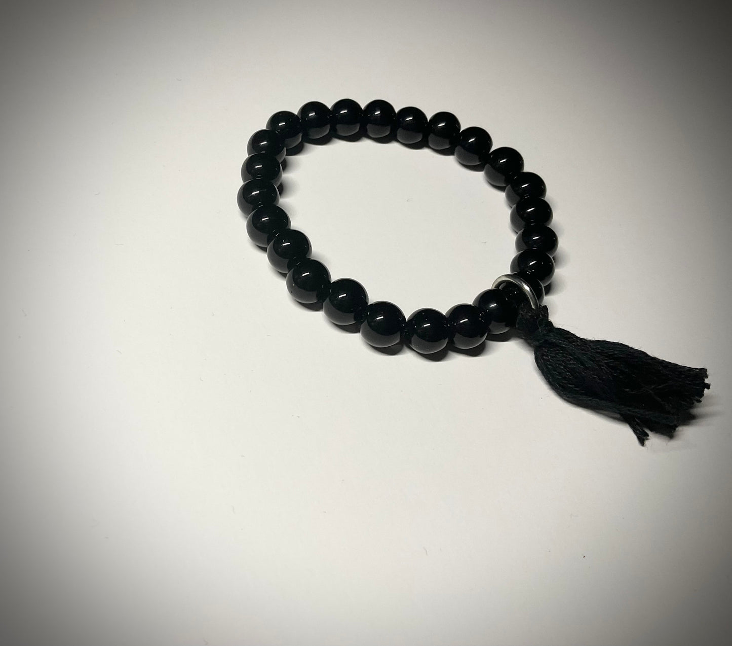 Black Mala Stretch Bracelet with Tassel