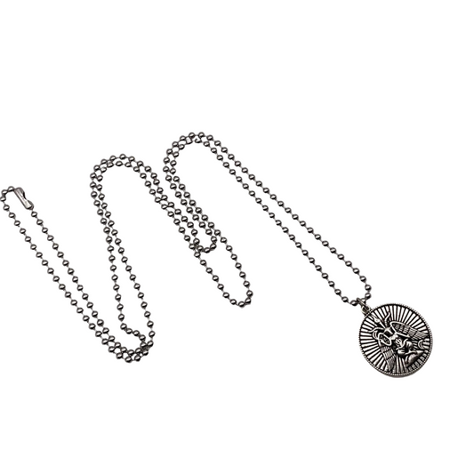 Silver tone necklace with a circular Baphomet pendant on a white background.