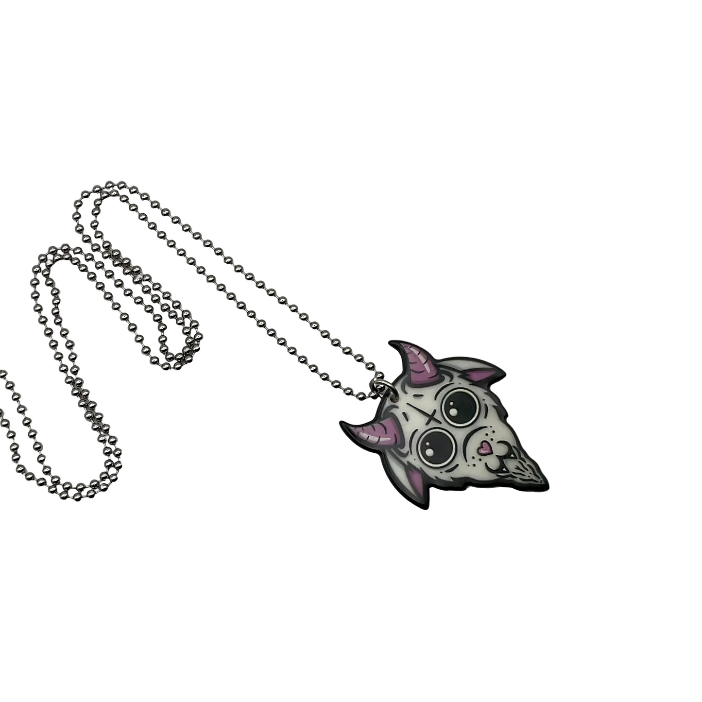 Necklace with a whimsical Baphomet goat head pendant on a ball chain on a white background