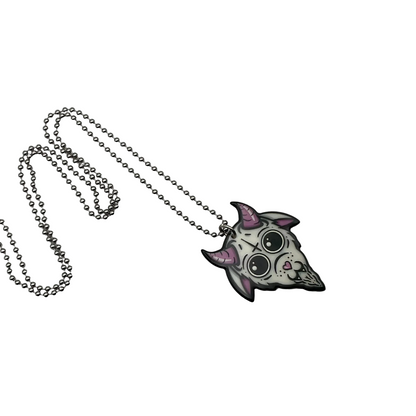 Necklace with a whimsical Baphomet goat head pendant on a ball chain on a white background