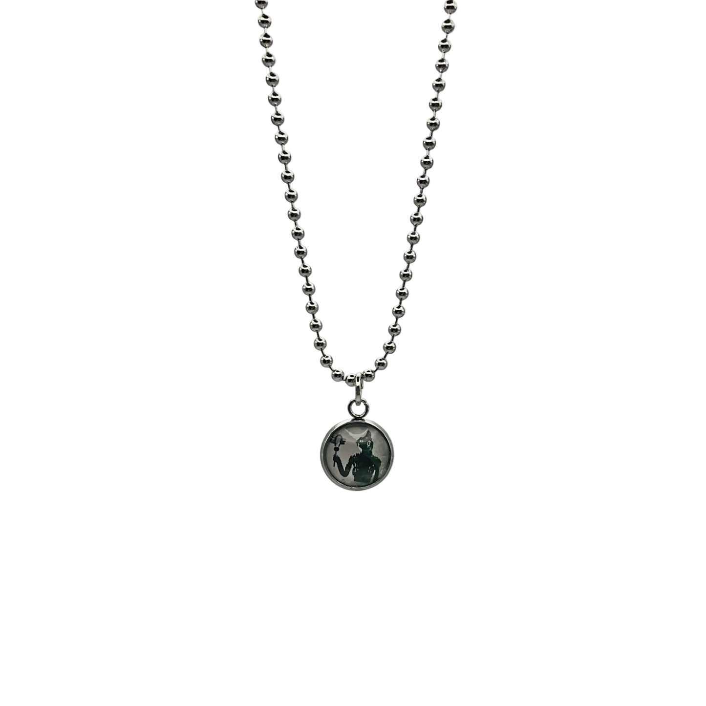 Silver tone Necklace with a round Bastet pendant on a white background.