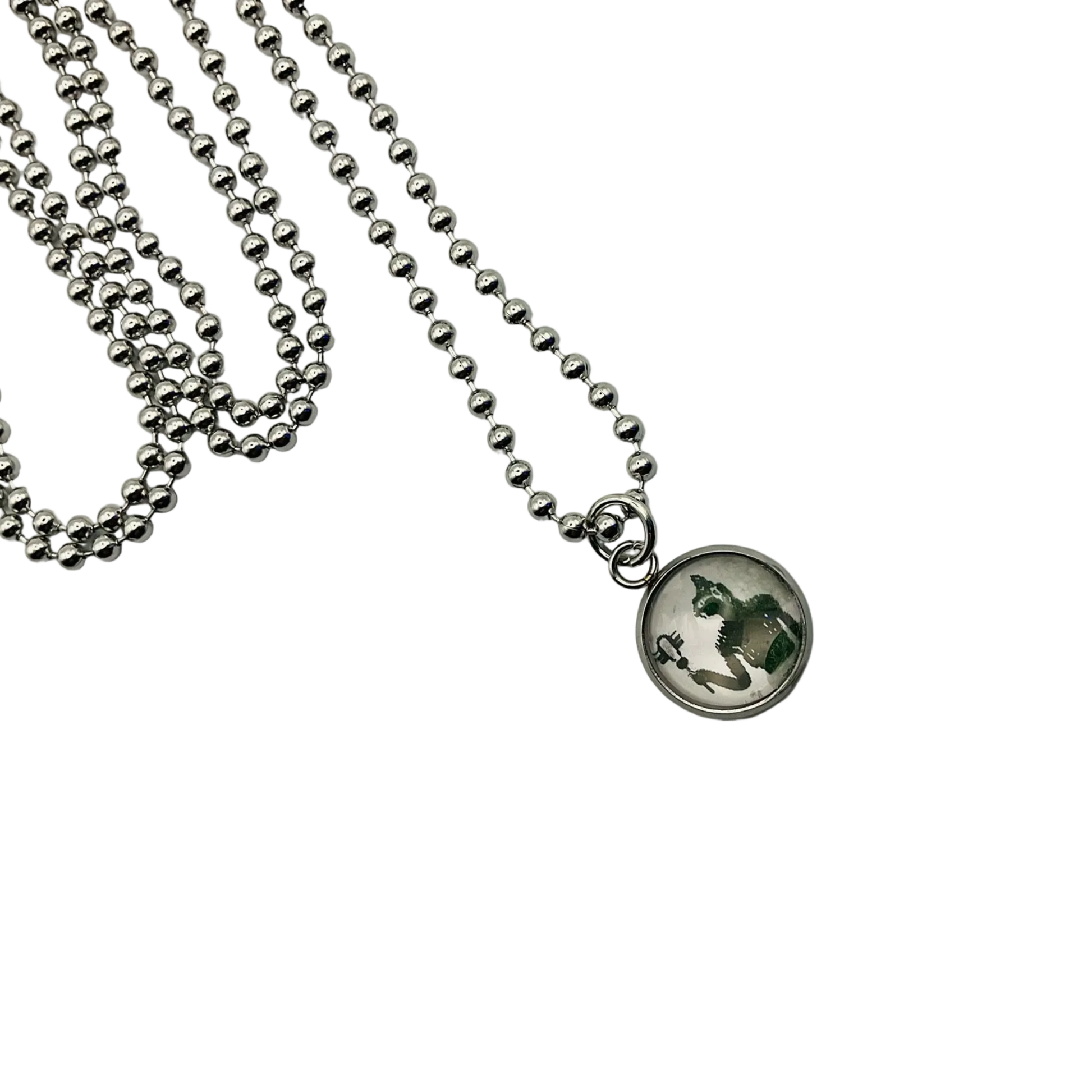 Necklace with a round pendant featuring a Goddess Bastet design on a white background.