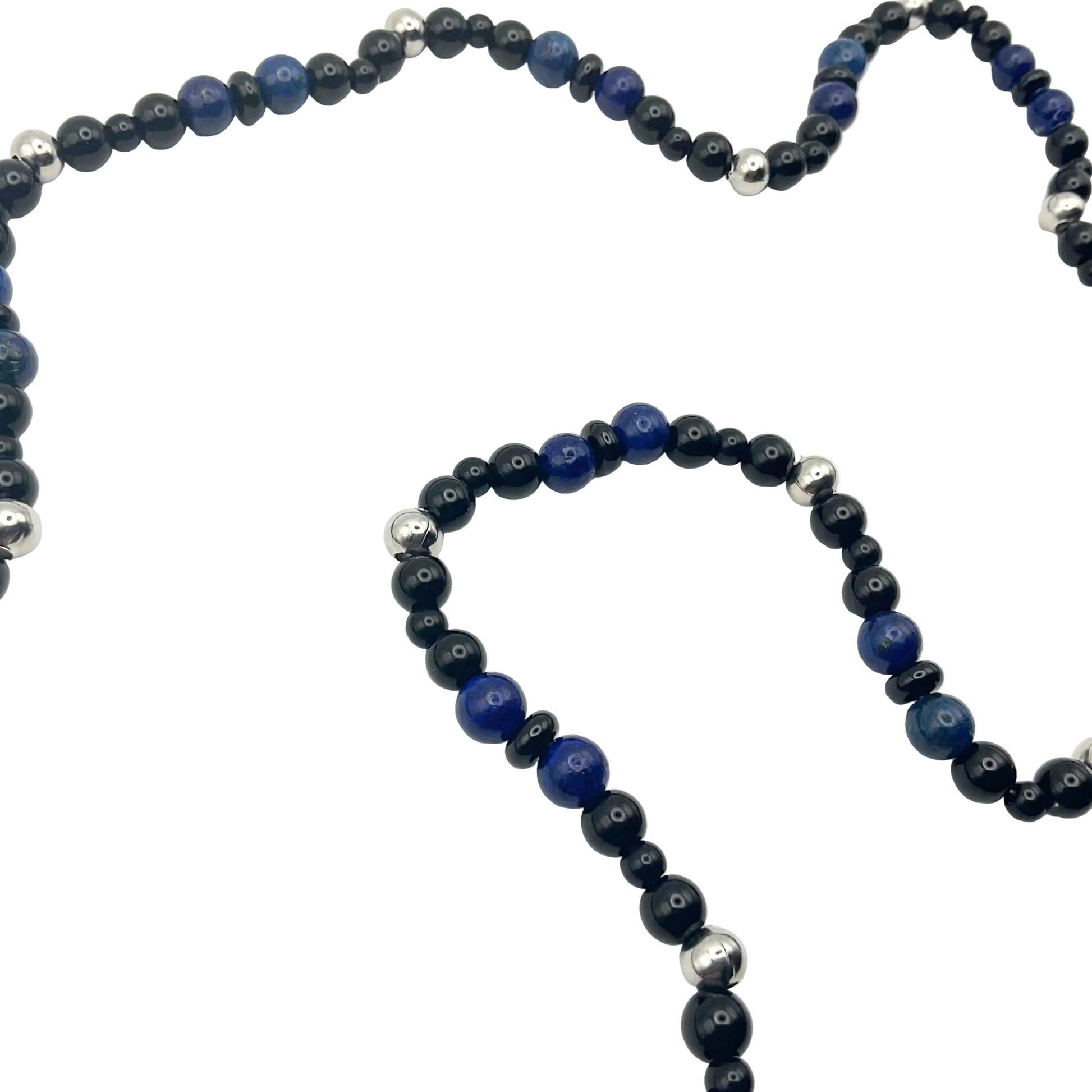 blue lapis lazuli necklace with black and steel bead accents against a white background.