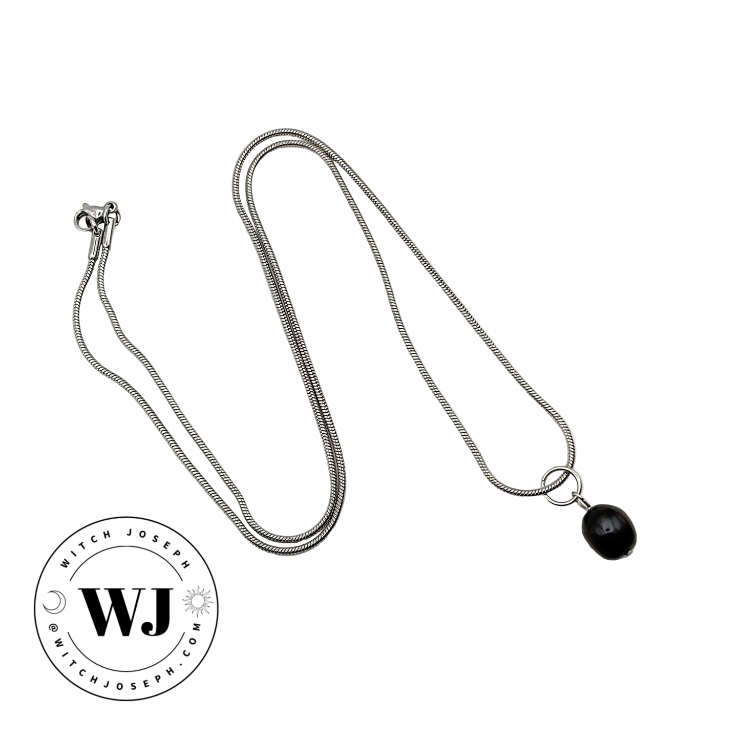 Silver tone necklace with a black pearl drop pendant on a white background, featuring the WJ logo.