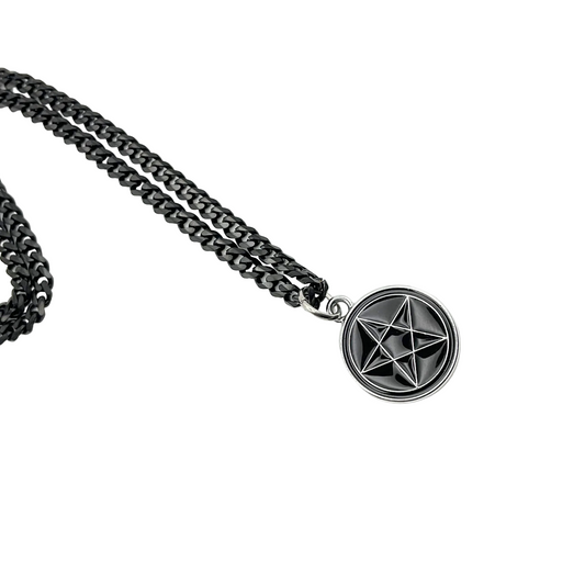 Necklace with a black pentacle pendant on a white background